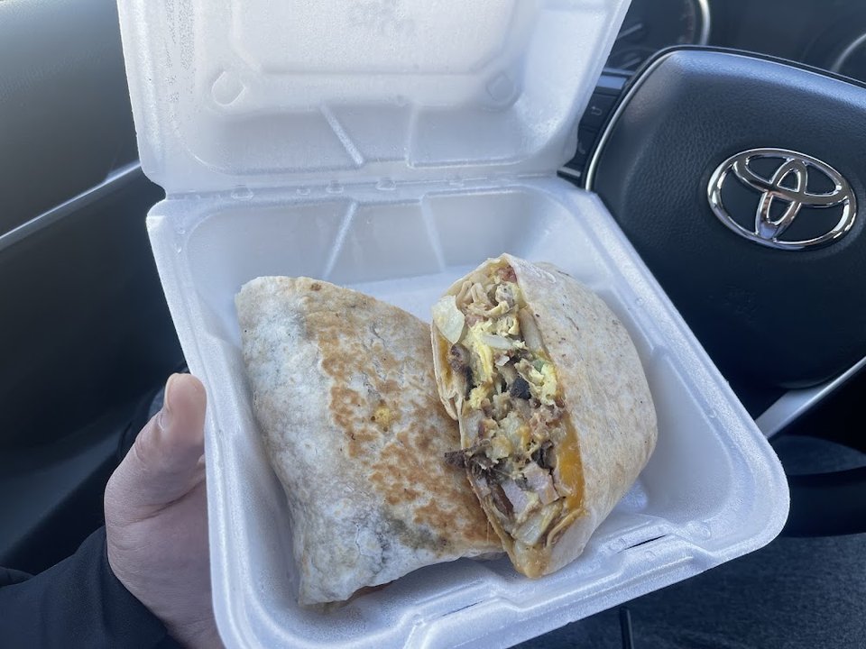 Printed menu with breakfast and lunch sections.