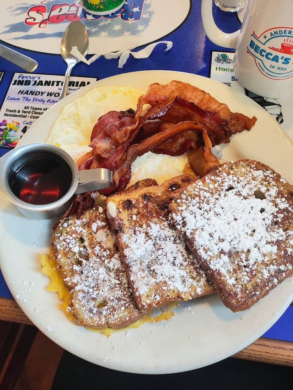 Printed menu with breakfast and lunch sections.