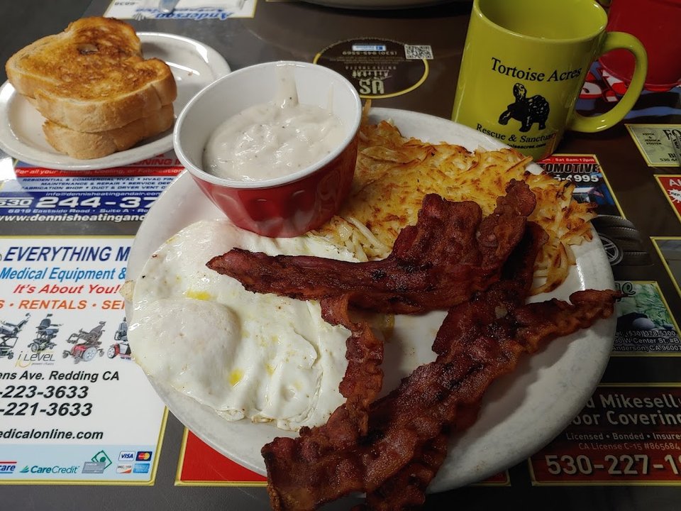 Printed menu with breakfast and lunch sections.